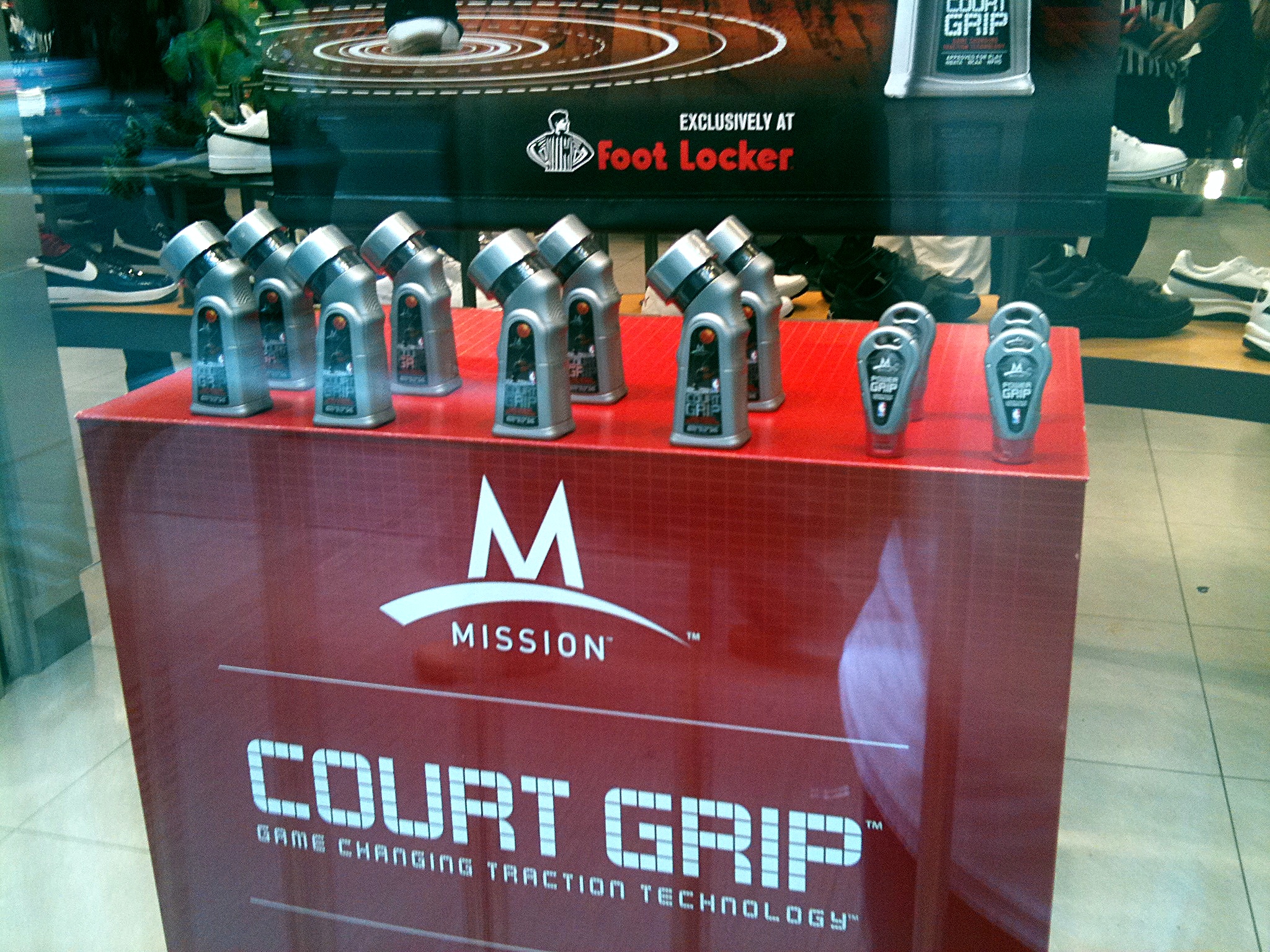 The tray in the window display, the Foot Locker header above it
