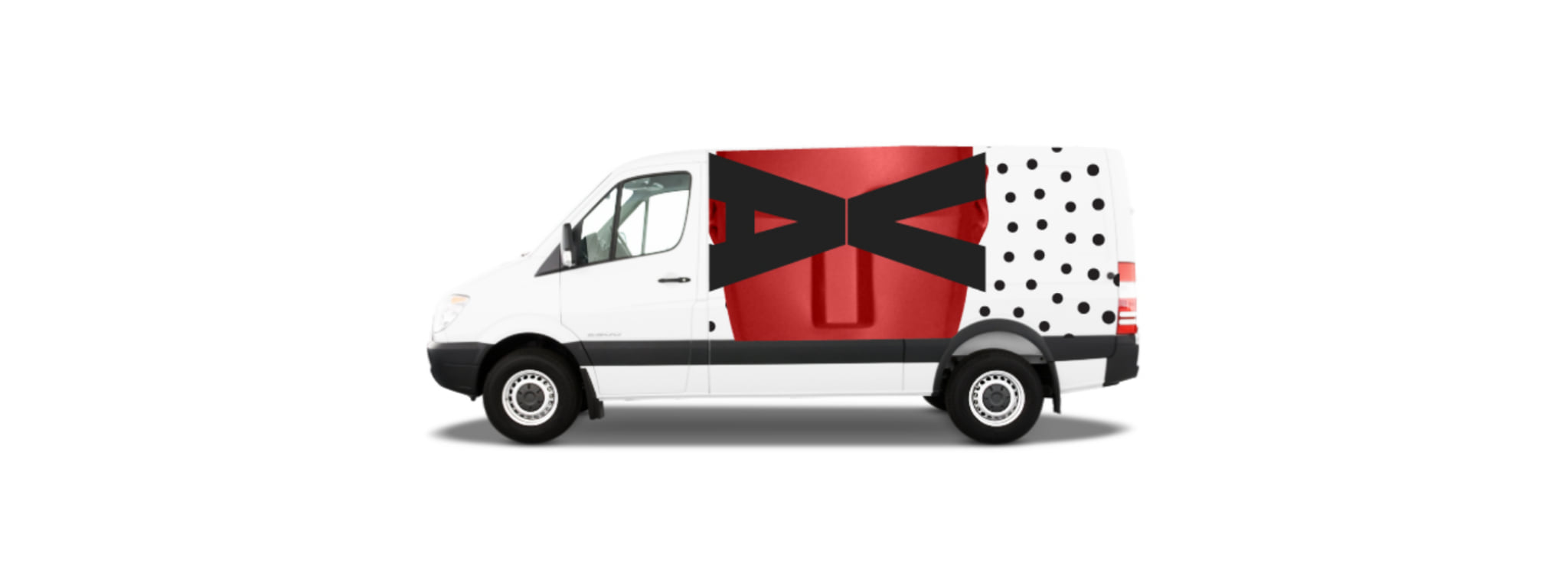 The wrapped van, one red panel carrying the mark at the size of a door
