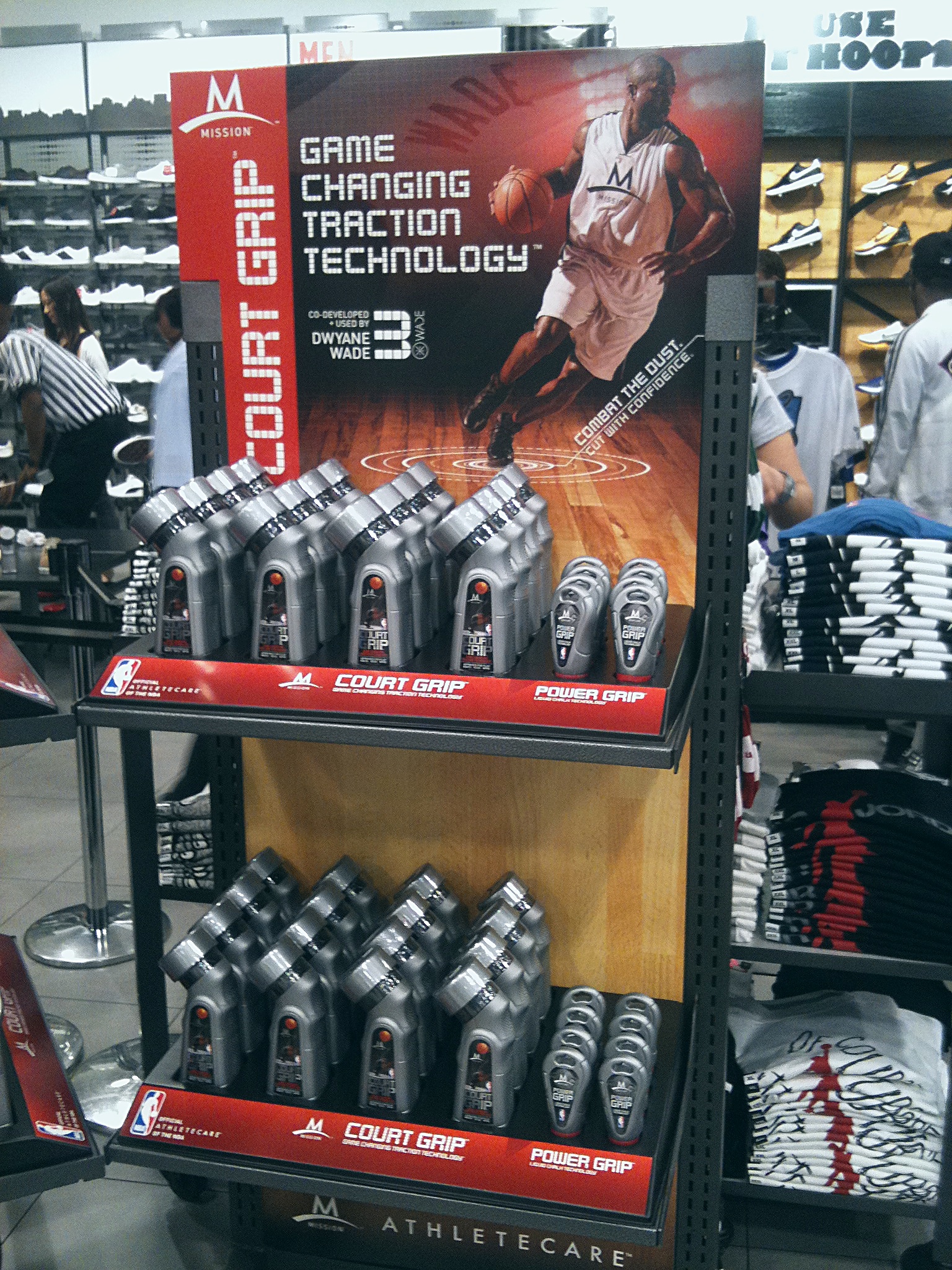 The gondola in the aisle, both products under one header